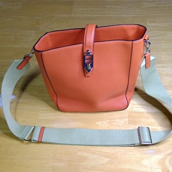 orYANY Handbags - orYANY Orange Leather Crossbody Bucket Bag with Green Strap